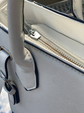 Load image into Gallery viewer, Handbag repaired with ZlideOn. With ZlideOn you can easy repair broken zippers.
